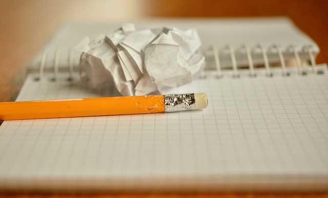 pencil, notebook, crumpled