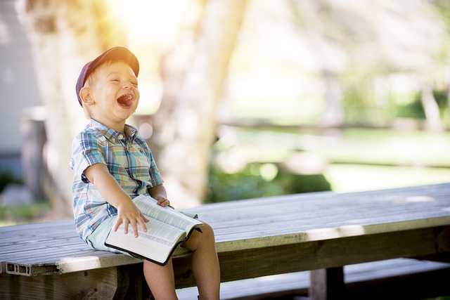 boy, laughing, reading