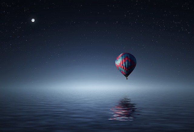 hot air balloon, night sky, lake