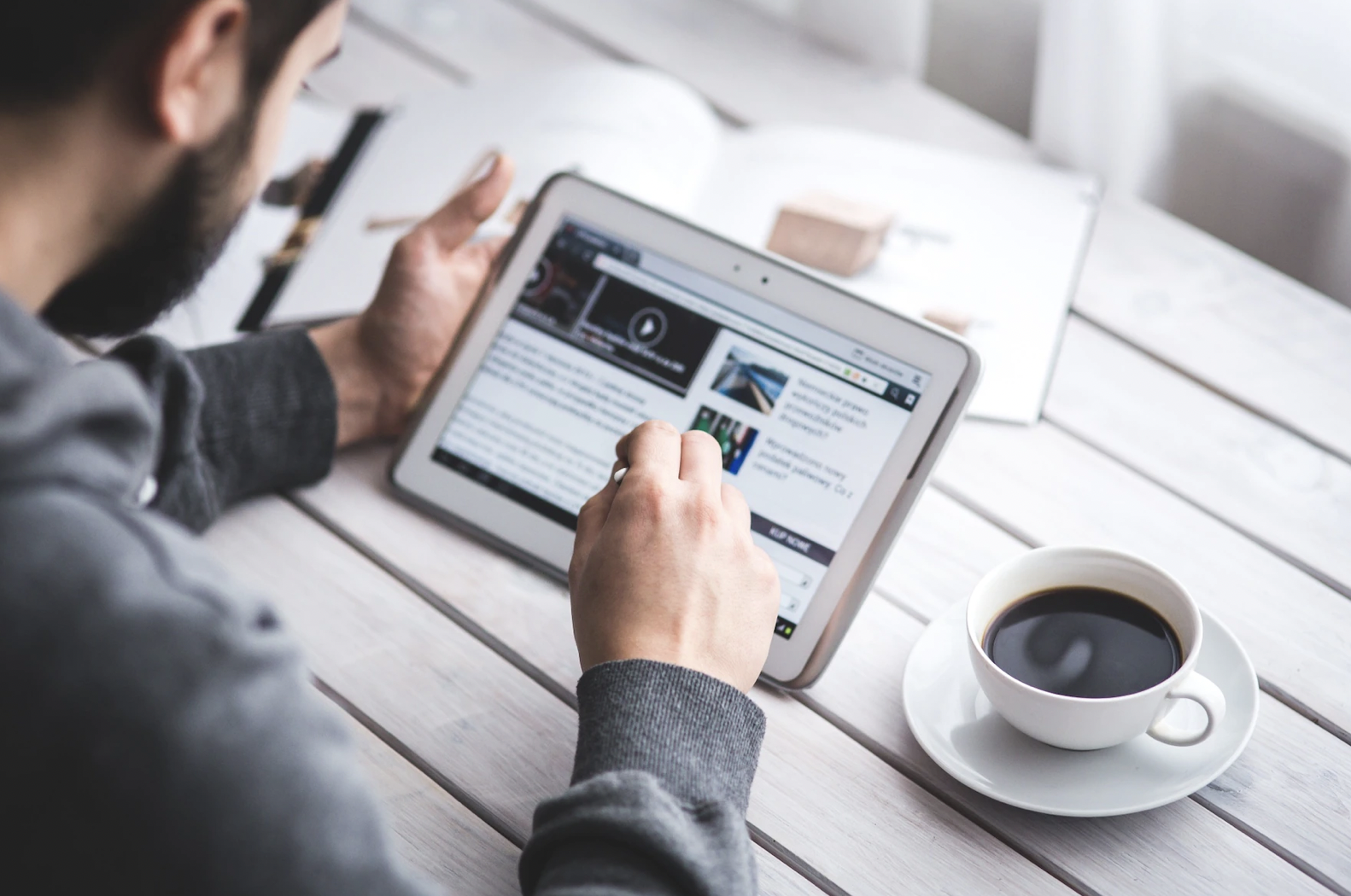 Man watching tablet